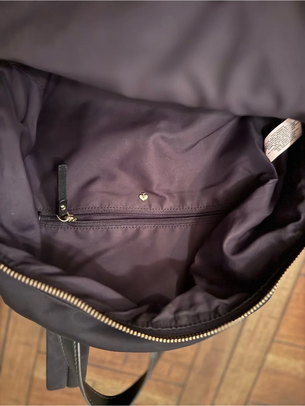 kate spade black nylon backpack with gold hardware